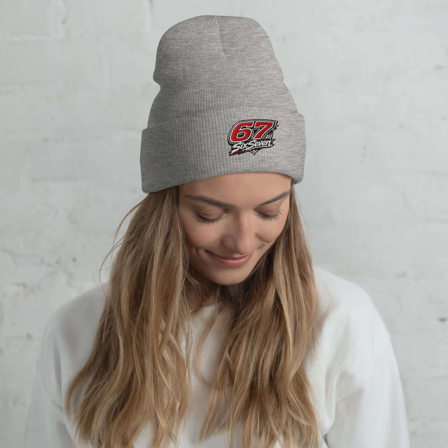 Cuffed Beanie worn by a woman, showcasing a stylish design and cozy fit for cold weather.