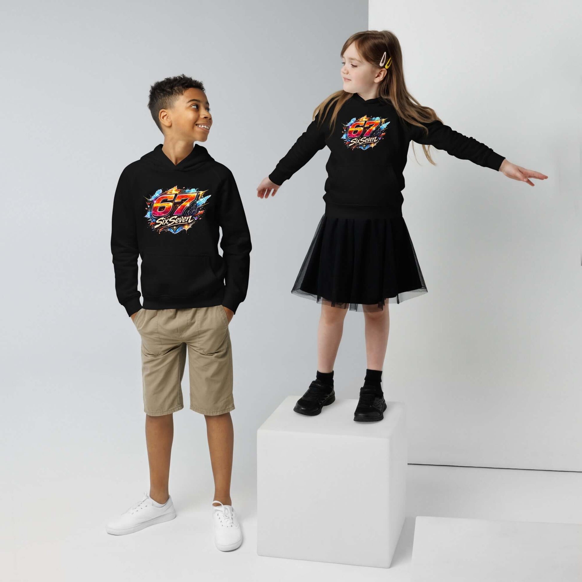 Kids eco hoodie worn by a boy and a girl, showcasing a comfy design with vibrant graphics.