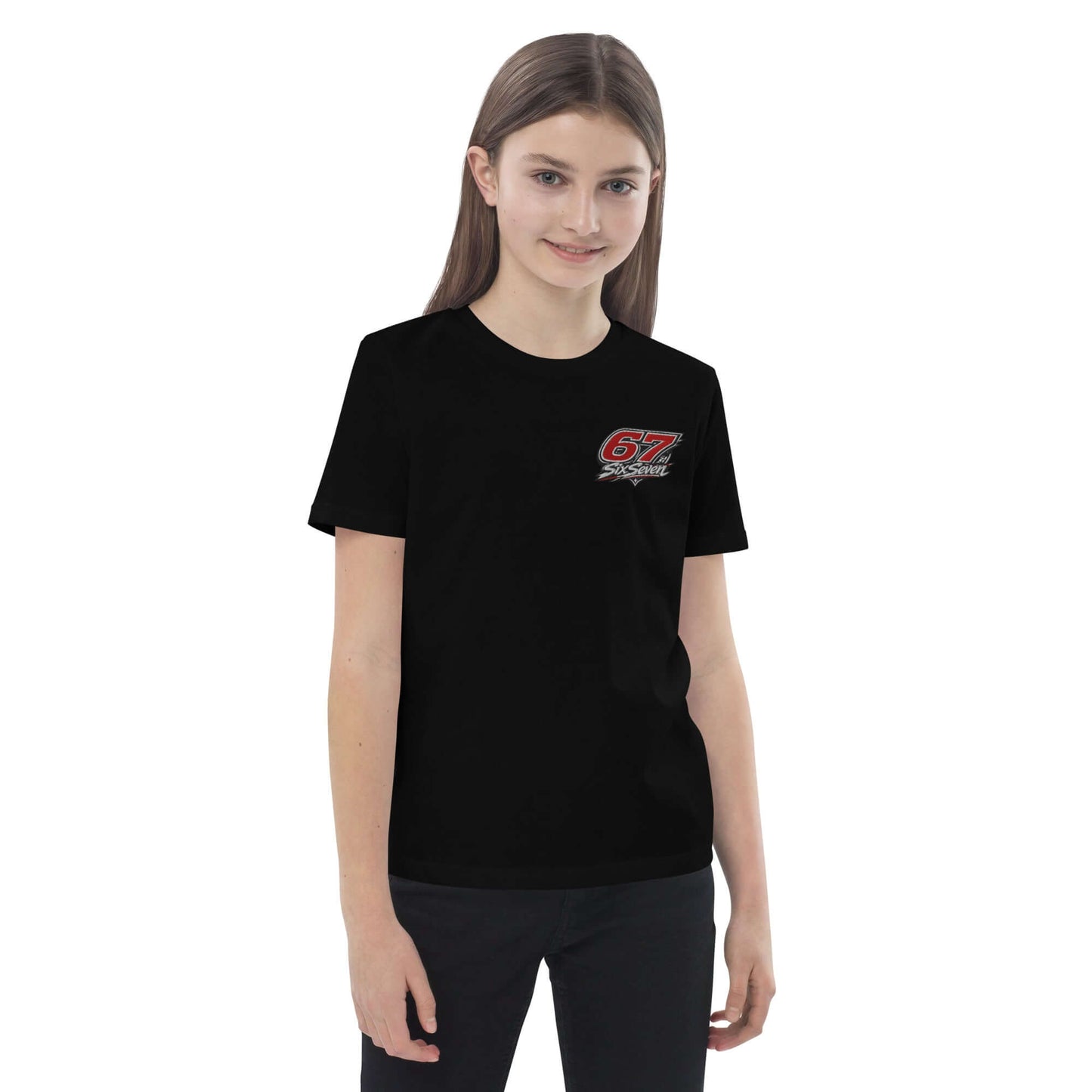 Organic cotton kids t-shirt displayed on a young girl wearing a black shirt with a graphic design.