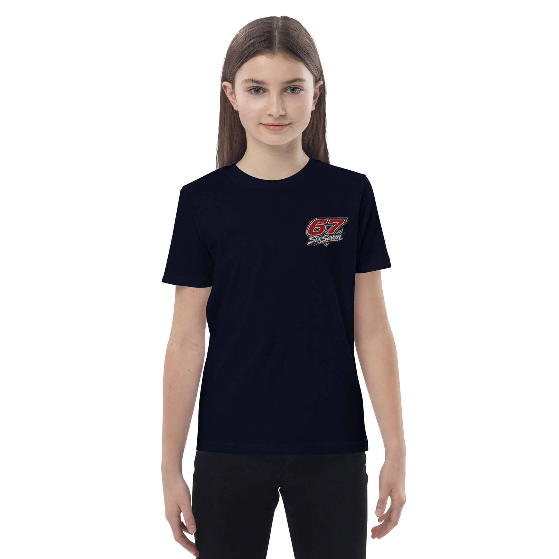 Organic cotton kids t-shirt in navy blue worn by a girl, featuring a small logo on the front.