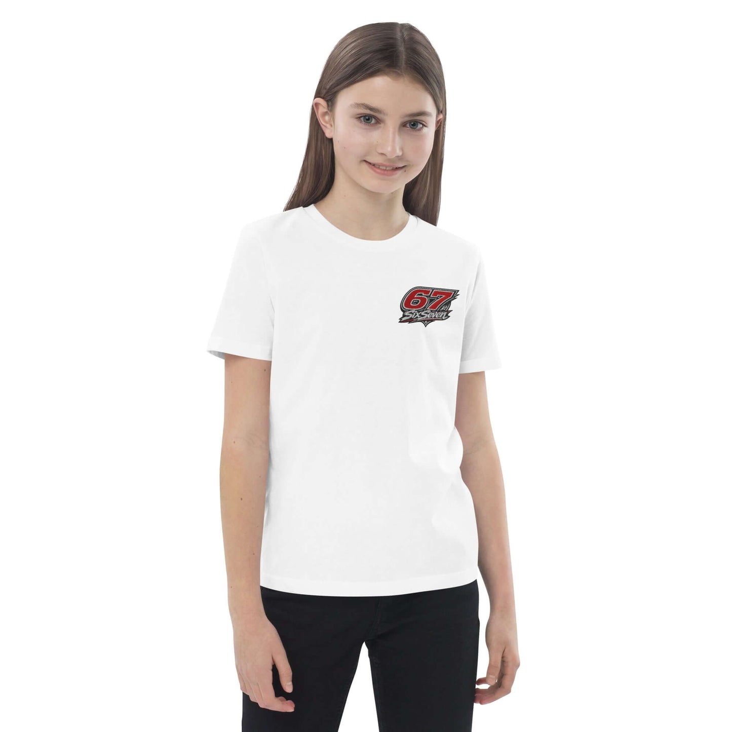 A girl wearing an Organic cotton kids t-shirt with a logo design on the front, ideal for comfort and sustainability.