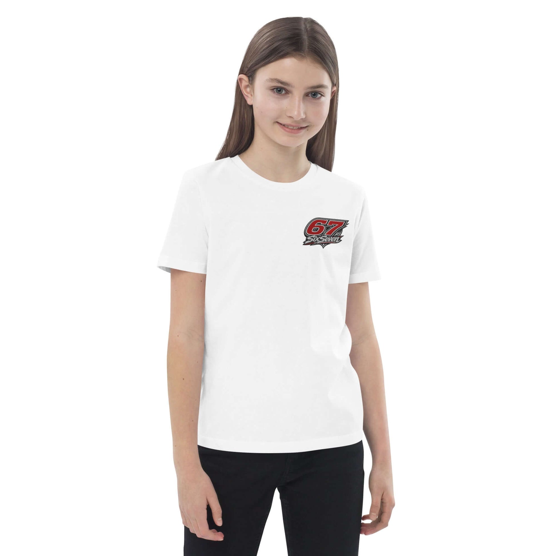 A girl wearing an Organic cotton kids t-shirt with a logo design on the front, ideal for comfort and sustainability.