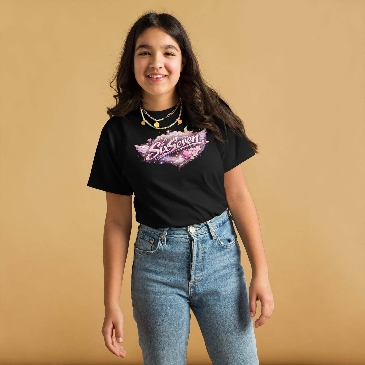 Youth classic tee worn by a girl, featuring a vibrant graphic design, perfect for casual adventures.