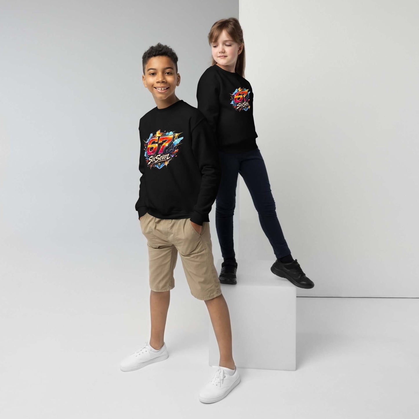 Youth crewneck sweatshirt worn by two kids, one standing and one sitting, showcasing a cool design and casual style.